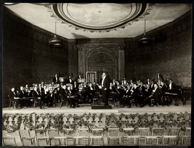 Full orchestra on stage, New York, 1911 by Byron Company